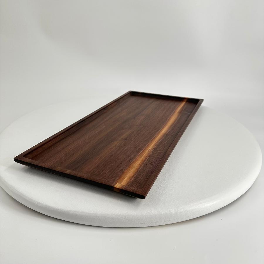 side view of walnut tray with beautiful grain pattern