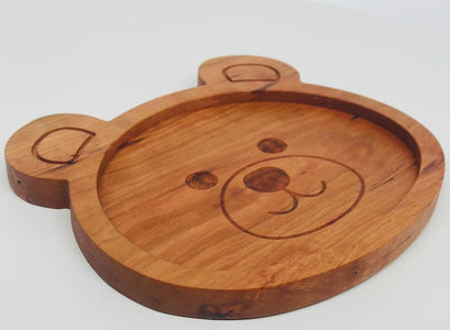 Children's solid cherry teddy bear plate with precious engraved face. 